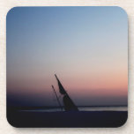 Sailboat at twilight, sunset drink coasters