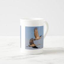 sandhill crane couple in flight bone china mug