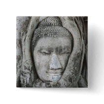 Sandstone head of Buddha surrounded by tree Pinback Buttons