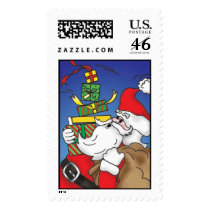 Santa balancing gifts postage