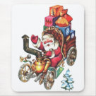 standard_mousepad - Santa is driving a unique and whimsical car. It has a funny stovepipe on its pot belly engine, a fancy seat and other delightful details. It is filled with gifts and goodies.: Sizes 