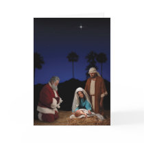 Santa Kneeling at Nativity Greeting Card