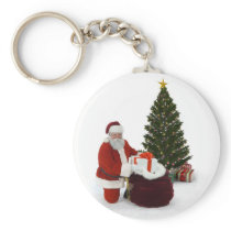 Santa setting presents by the tree key chain