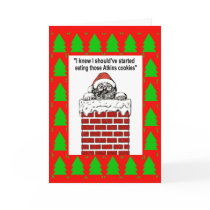 Santa Stuck In A Chimney Greetings Card