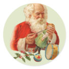 round_sticker - Santa is concentrating on his work. Making sure the doll he is working on is just right for a waiting child. Vintage Santa Claus is charming and sure to please on many gifts and apparel in my store.: Sizes 