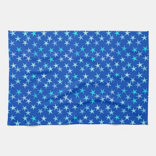 Satin stars, pale blue on cobalt towels