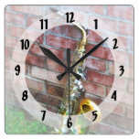 Saxophone Against Brick Wall Clocks