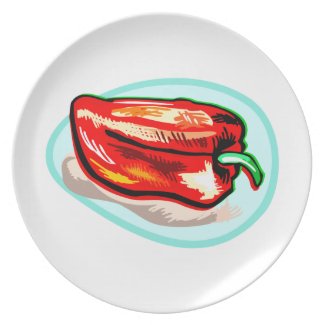 Scribbled red pepper on blue circle plate