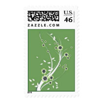 Scrolls with flowers on green ground - postage stamp