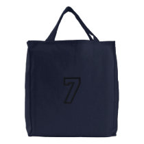 Seven embroidered bags