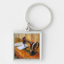Sewing Machine With Orange Thread Key Chain