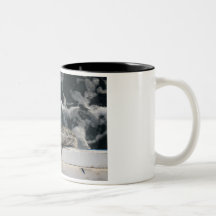 Shore and wheel on a fishing boat coffee mugs