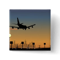 Silhouette of an airplane in flight pinback buttons