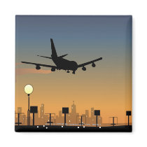 Silhouette of an airplane in flight fridge magnet