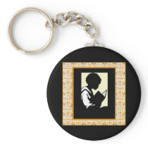 Silhouette of boy reading key chains