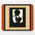 Silhouette of boy reading mousepads
