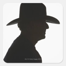 Silhouette of man in profile wearing traditional stickers