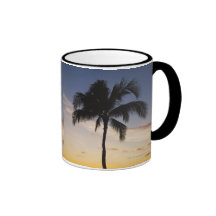 Silhouette of one Palm Tree by a Red Orange Sunset Coffee Mugs
