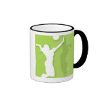 Silhouette of two women playing volleyball coffee mug