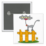 silly gray cat standing on a fence cartoon pin