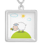 silly sheep on a hill with a flower pendant