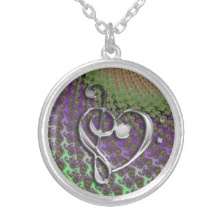 Silver Music Clef Heart Necklace on Colorful Back