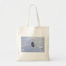 Single plant in a snowy landscape bags