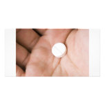 Single white pill in palm customized photo card