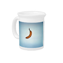 Single whole unpeeled banana drink pitcher