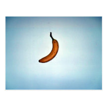 Single whole unpeeled banana postcard
