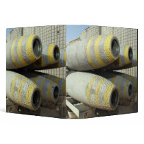 Six GBU-12 bombs sit in a rack Binders