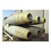 Six GBU-12 bombs sit in a rack