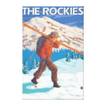 Skier Carrying Snow Skis - The Rockies Canvas Prints