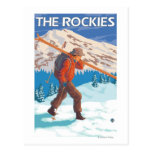 Skier Carrying Snow Skis - The Rockies Postcard