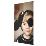Small boy dressed as pirate stretched canvas prints