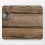 Small glass on wooden brown fishing dock planks mouse pad