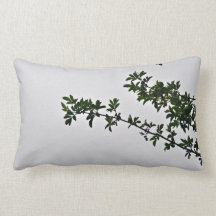 Small Green Leafy Branch against cloudy sky Pillow