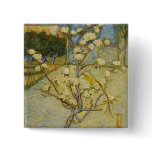Small pear tree in blossom Button