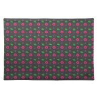 small pink flowers and green leaves. place mats