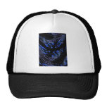 Smeared line of blue floral against a black back mesh hats