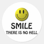 Smile, there is no hell. round sticker
