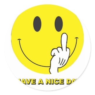 smiley face giving the finger round sticker