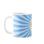 Smiling cartoon star on blue mug