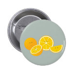 Smiling group of oranges pin
