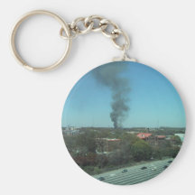 Smoke Stream Raising From A House Fire Accress The Keychains
