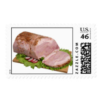 Smoked meat on wooden board. postage stamps