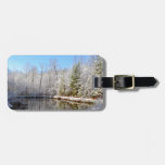 Snow covered landscape around the pond bag tag