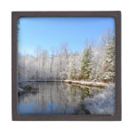 Snow covered landscape around the pond gift box