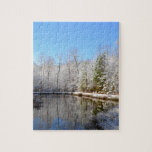 Snow covered landscape around the pond jigsaw puzzle