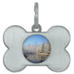 Snow covered landscape around the pond pet name tag